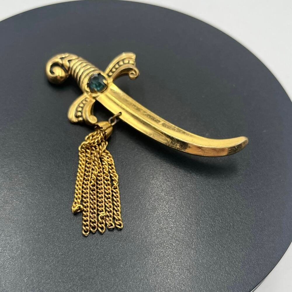 Coro Vintage Signed Gold Tone‎ Sword Dagger Brooch With Tassels and Green Stone